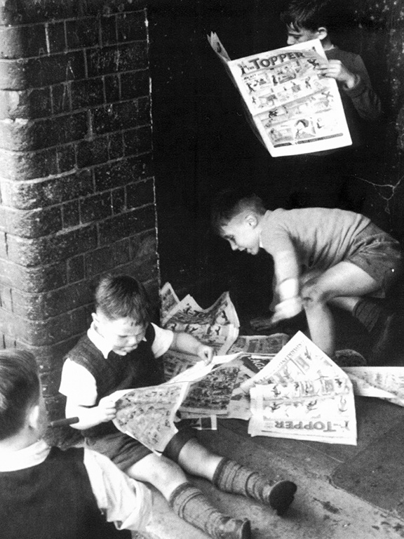 Children reading comics.